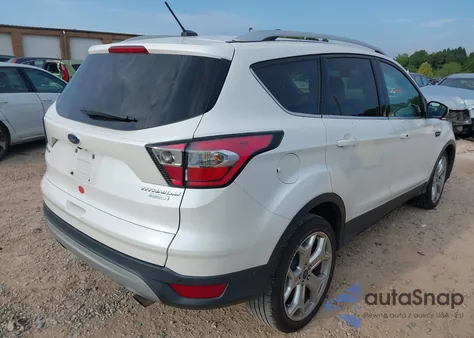 2017 Ford Escape Titanium z USA, uszkodzony, nr VIN 1FMCU0J94HUC92556